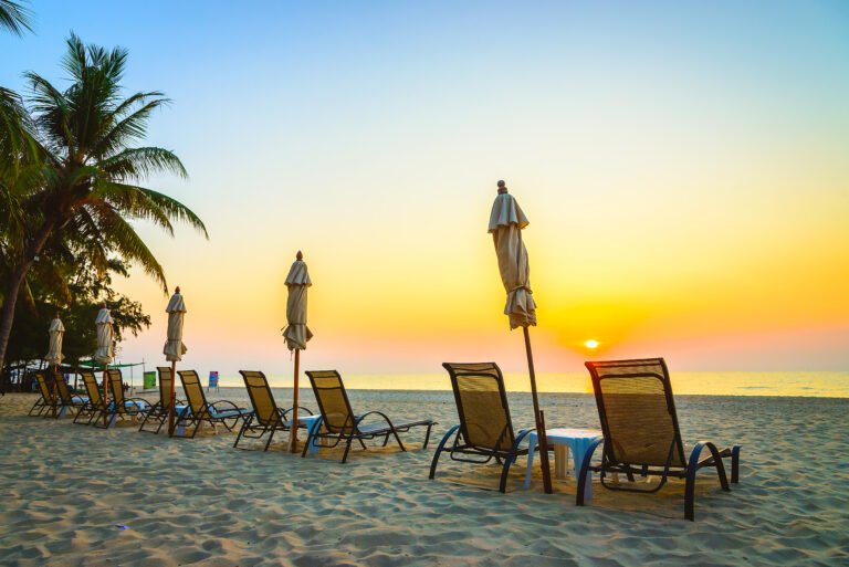 Beach chair with sunrise on twilight time - vintage filter